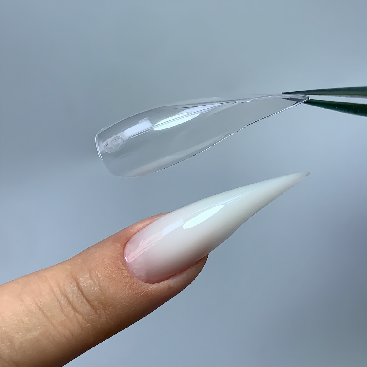 C07 geometric dragon claw nail forms, close-up of faceted design