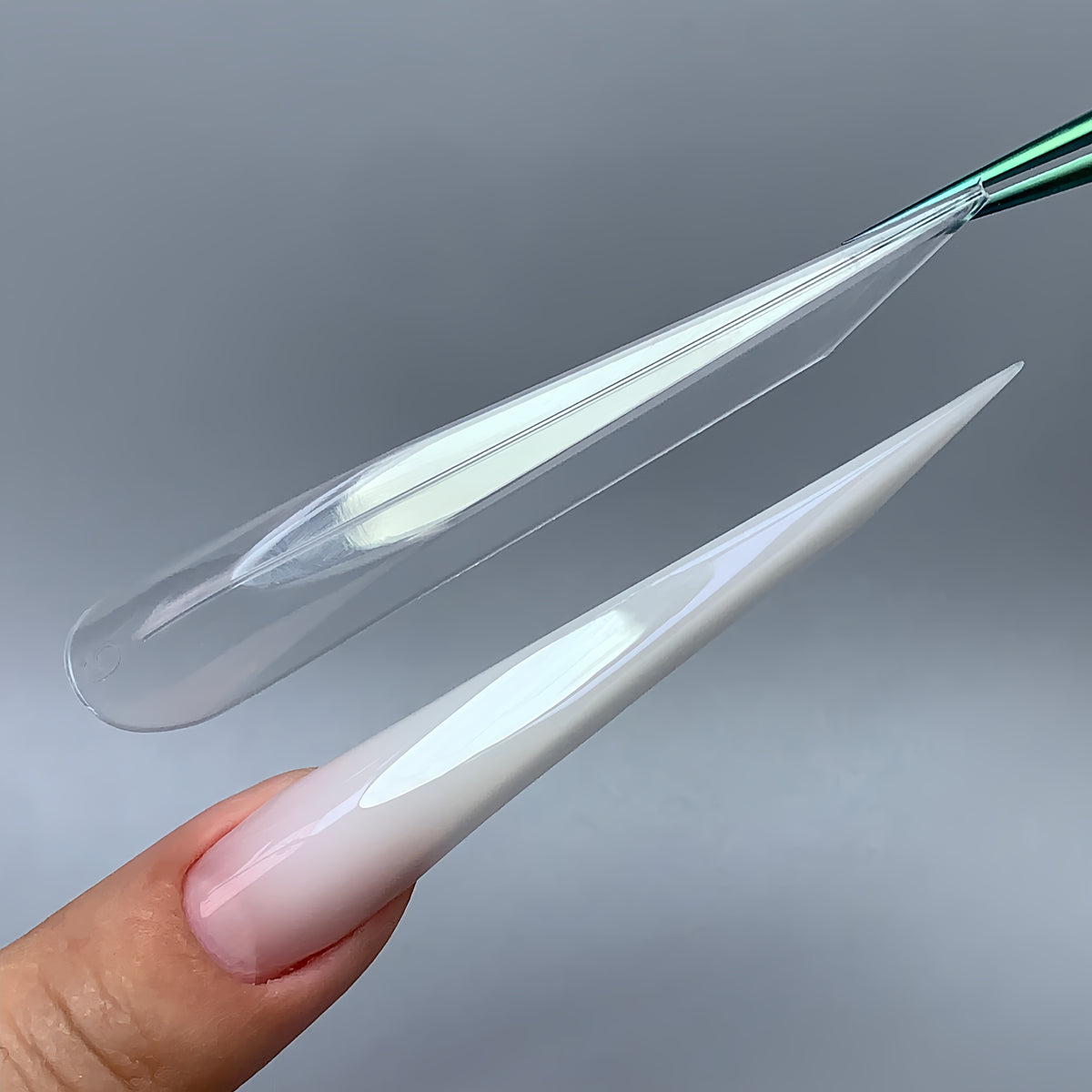 C12 Gamer Ferrari nail forms with wide angular shape, close-up view