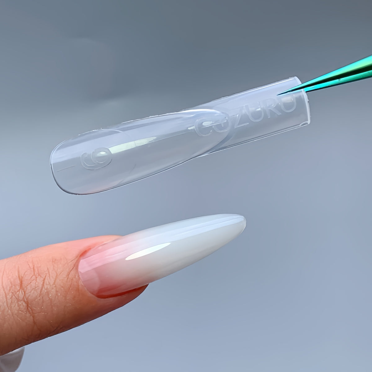 COZURU C29 clear almond dual form held over finished ombre almond gel nail extension
