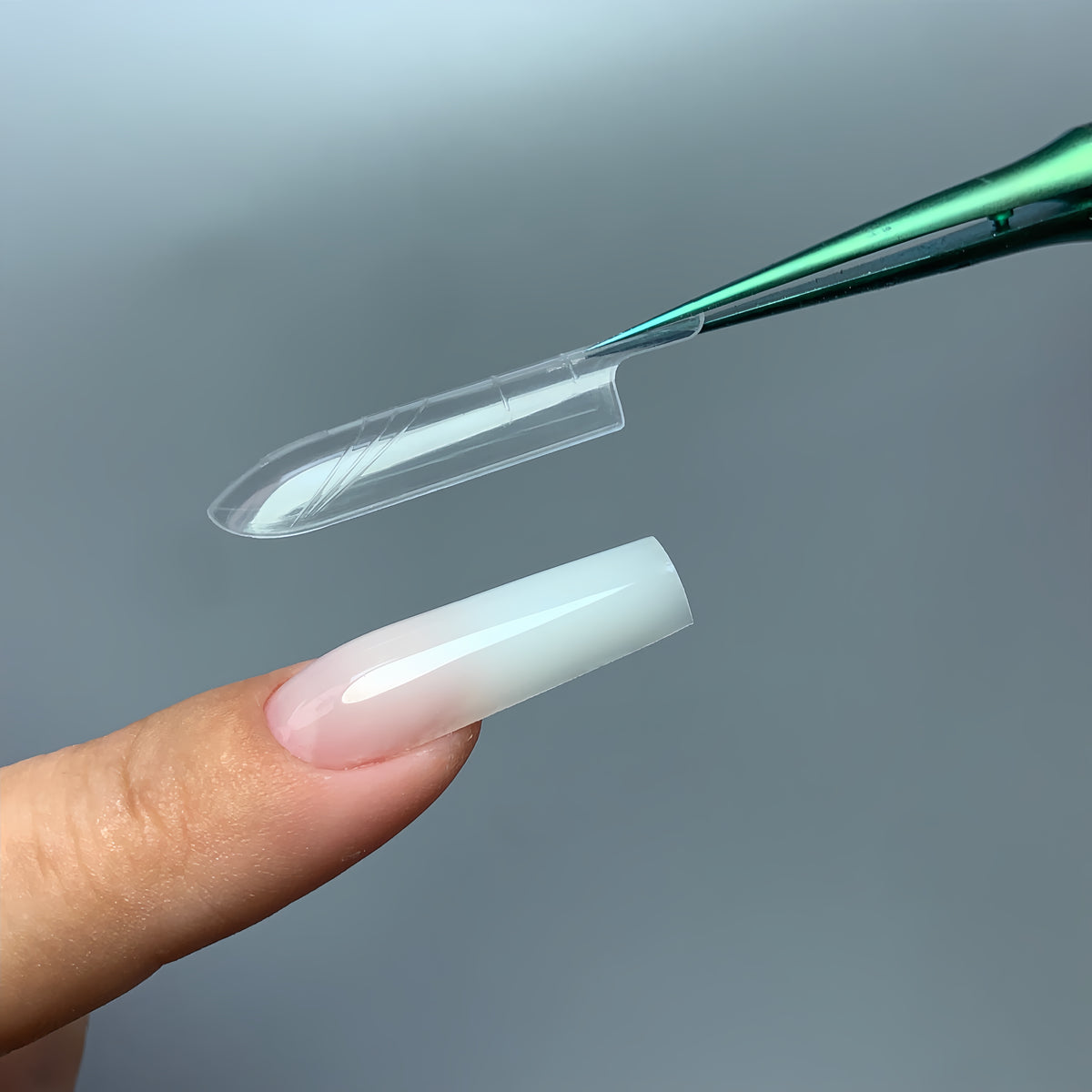 Natural short square gel nail extensions made with COZURU C02 forms