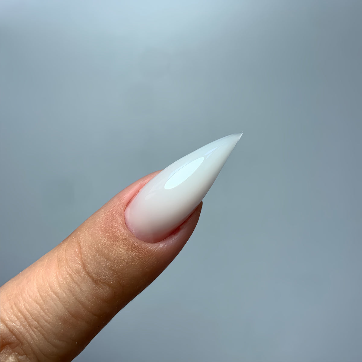 Dramatic curved cat claw gel nails made with COZURU C06 forms