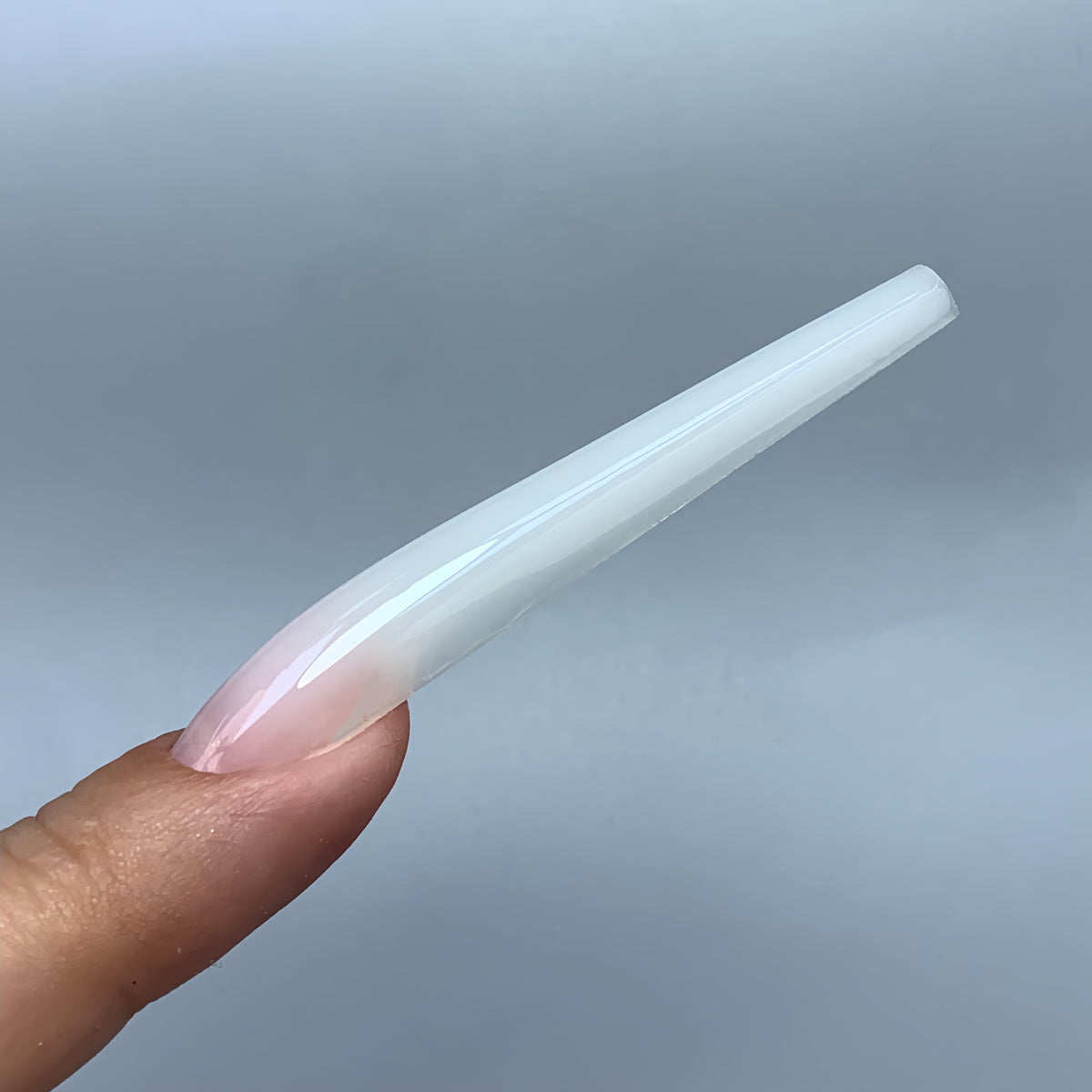 Side view of a finished slim tapered nail made with COZURU C10 forms