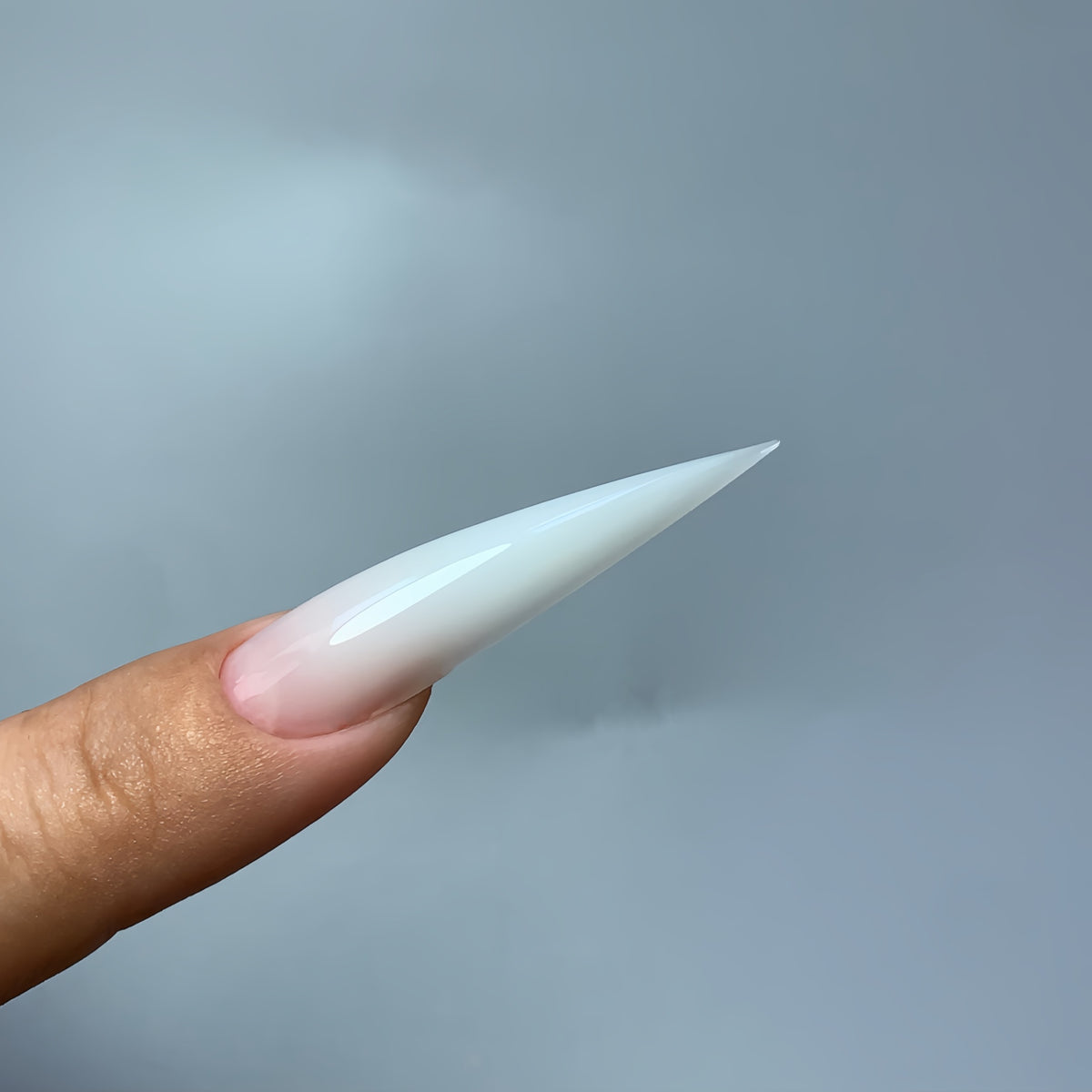 Finished medium stiletto nails made with COZURU C01 dual forms