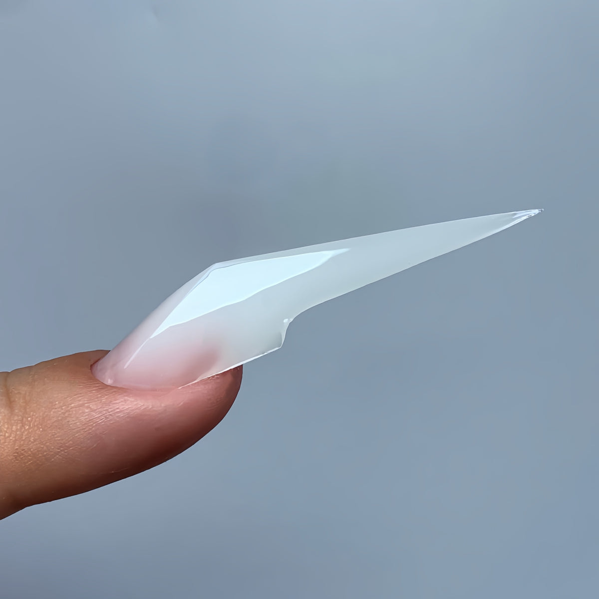 Side view of a finished mechanical claw nail made with COZURU C14 forms