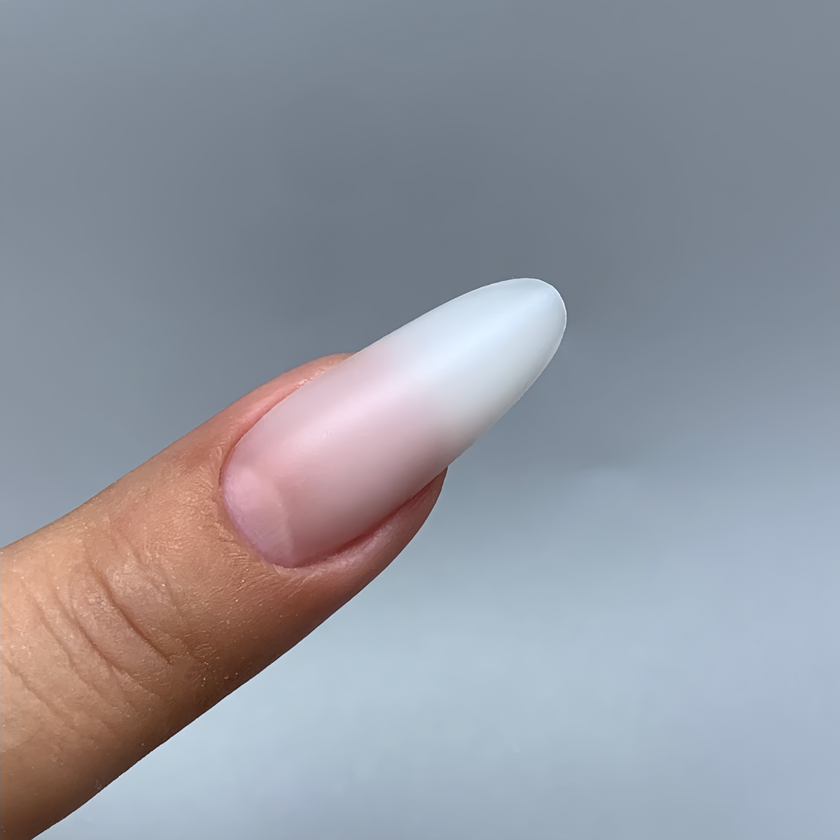 Oval polygel nail extension shape made with COZURU C17 dual forms